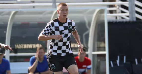 Cross, Zingas Lead Men's Soccer Past Yale, 3-1 Image