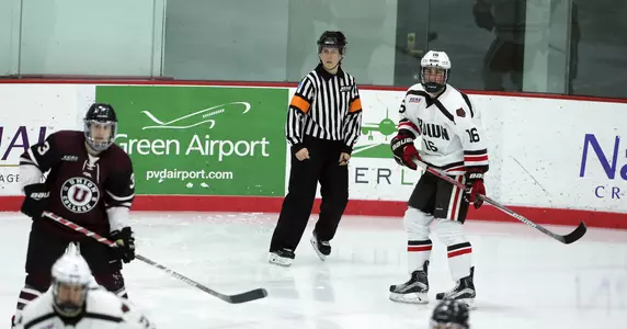 A woman refereeing men's D-I hockey, Katie Guay fits right in Image