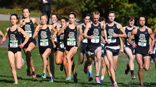 Action shot of both the women's and men's cross country teams