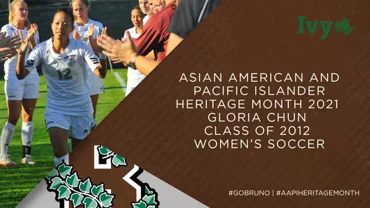 Women's soccer player high fives teammates during lineup introductions