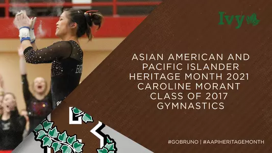 Gymnast Caroline Morant claps after a routine