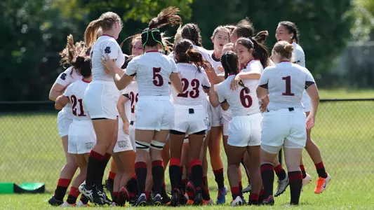 Women's rugby group celebration