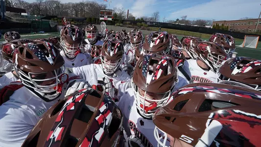 Men's lacrosse team huddle