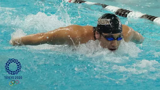 Jagger Stephens action photo with Olympic logo