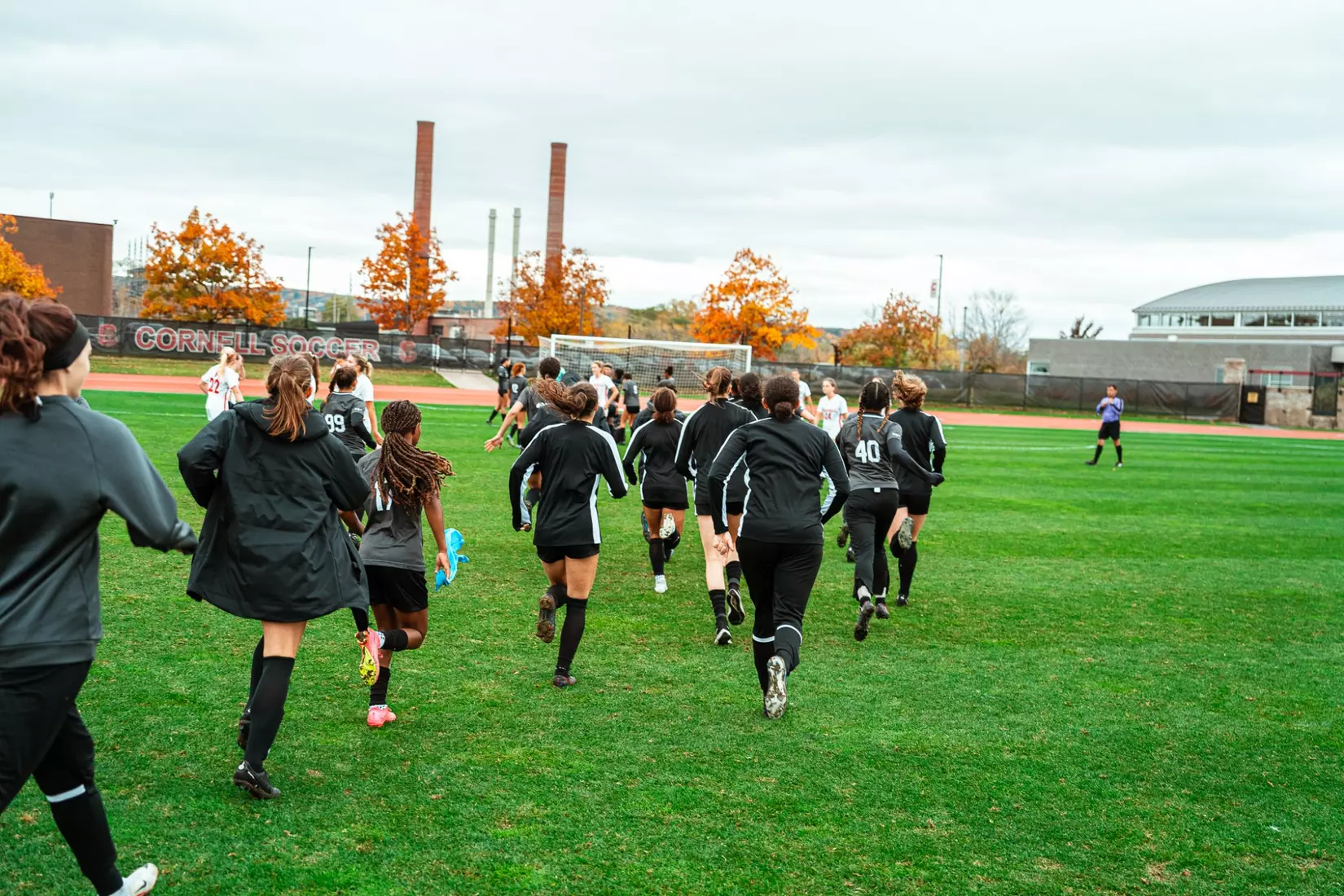Team Celebrates winning fourth consecutive Ivy League Championship after 2-1 win at Cornell on Saturday, October 21.