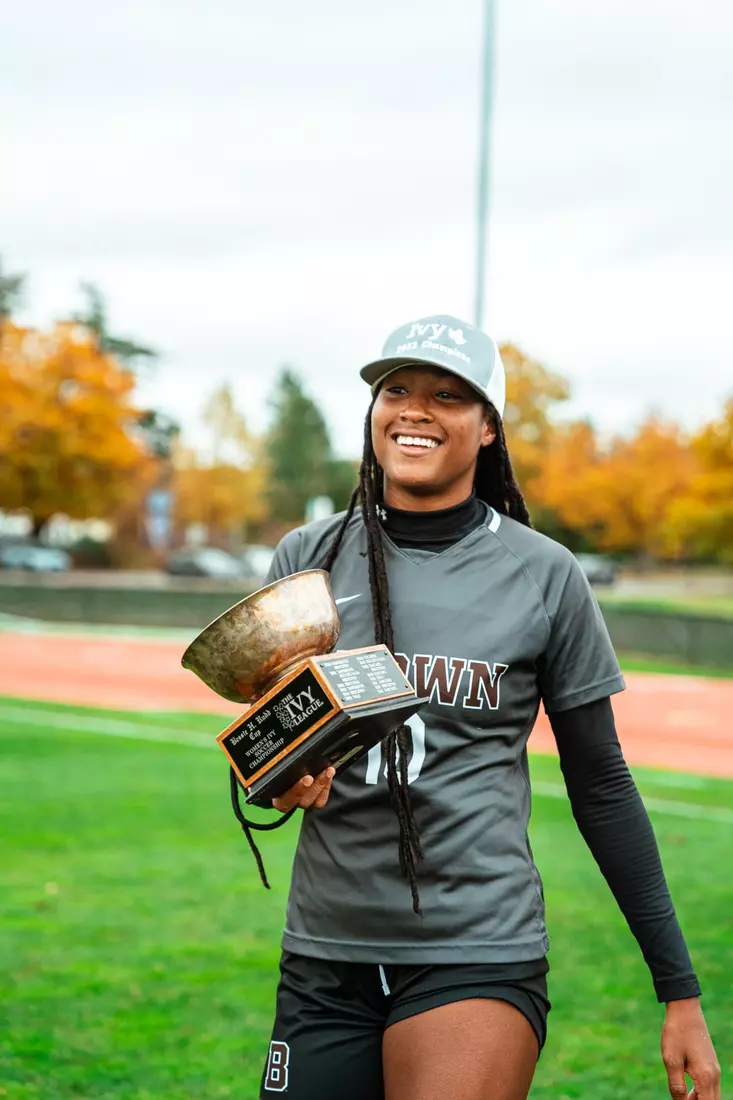 Brittany Raphino celebrates winning her fourth Ivy League Championship Saturday, October 21 at Cornell