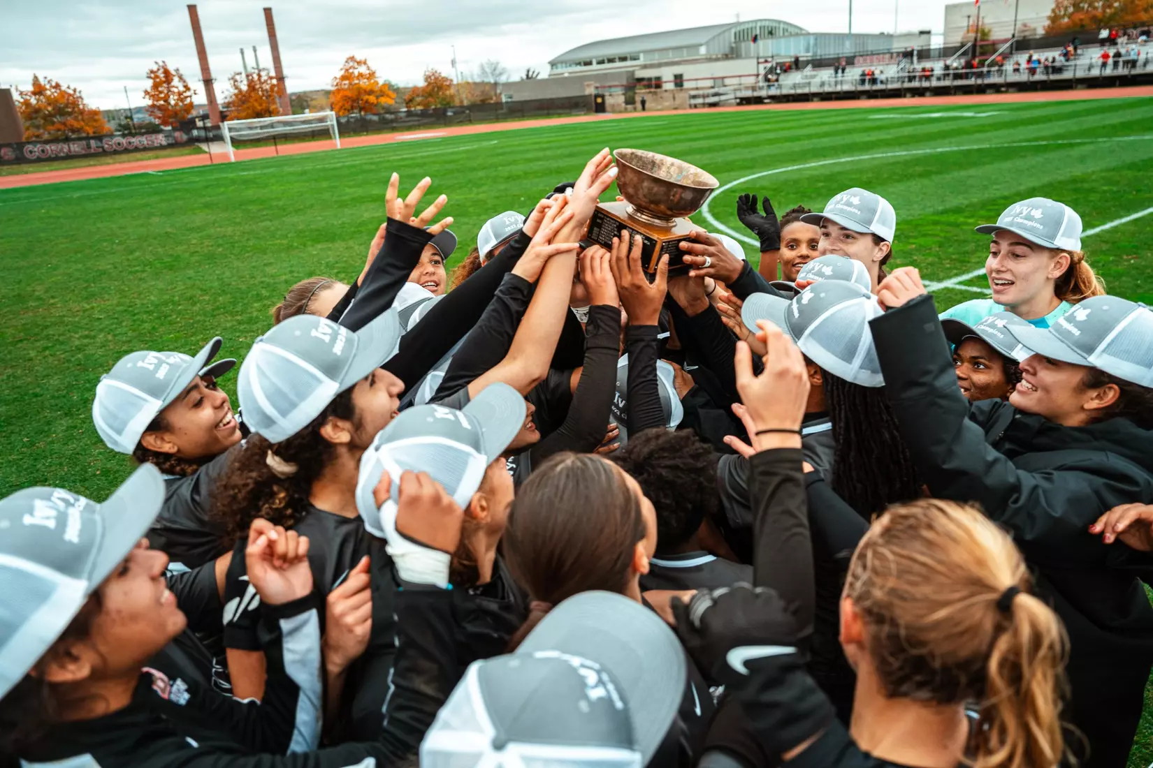 Team celebrates winning their fourth consecutive Ivy League Championship on Saturday, October 21 at Cornell