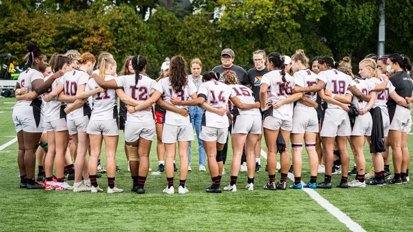 Women's Rugby huddle