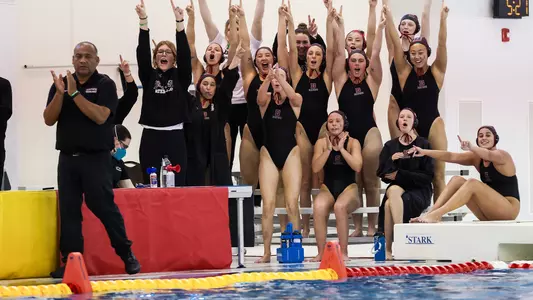 Women's Water Polo Celebrates Goal vs Wagner