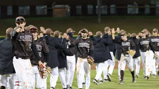 team-postgame-handshakes-Cary