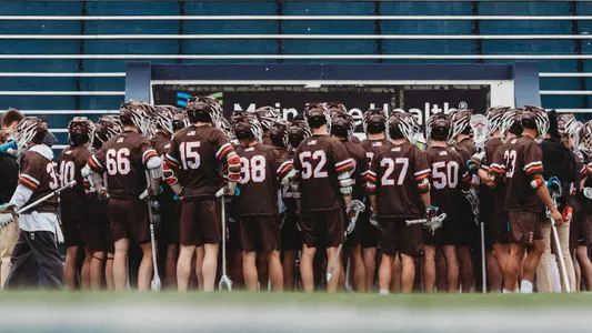 MLAX team huddle