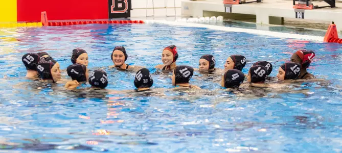 Women’s water polo team huddle