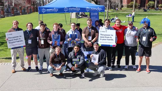 Members of the Brown football team pose at the team's 2025 Bone Marrow Registry Drive
