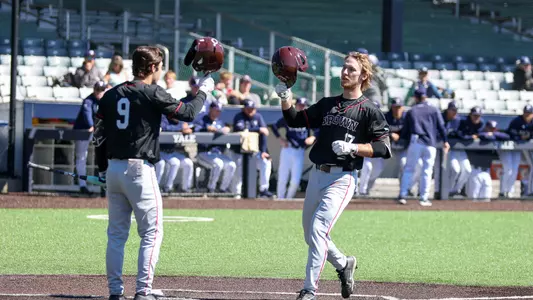 DJ Dillehay celebrates a home run against Yale