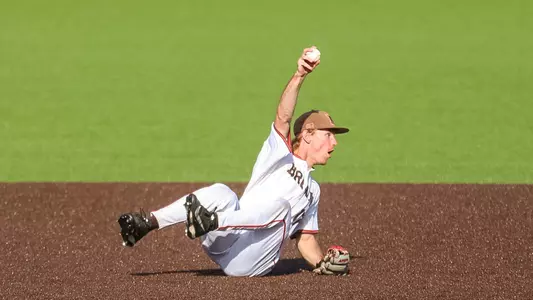 DJ Dillehay makes a sliding play against Bryant on March 31, 2026