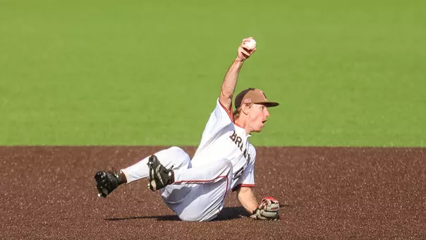 DJ Dillehay makes a sliding play against Bryant on March 31, 2026