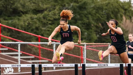 Elle Riley hurdles at a meet during the 2024 season