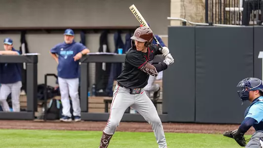 Alex Mihailovich bats against URI on March 8, 2026
