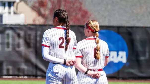 Maya Choksi and Cameron Zytkewicz Ray during the national anthem