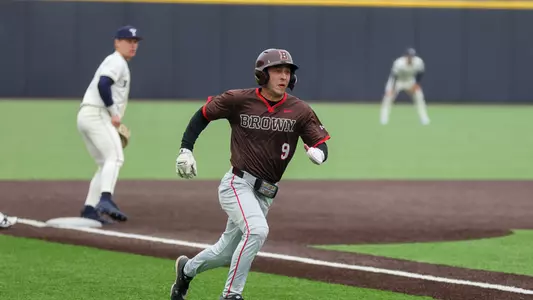 Logan Meusy heads for home in a game against Yale in March 2026