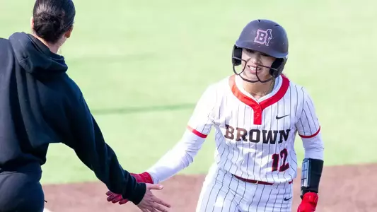 Jasmine Hsiao celebrates a home run