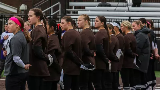 Brown softball stands for national anthem