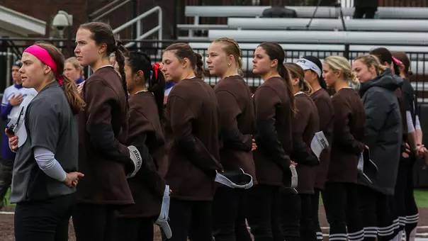 Brown softball stands for national anthem
