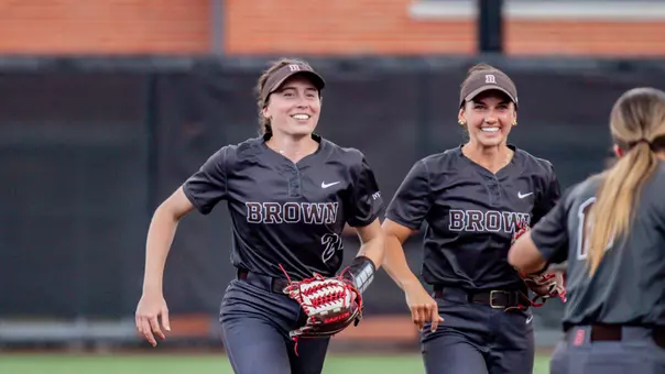 Reagan Crosthwaite runs in from the outfield at Providence College
