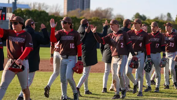 Brown shakes hands after defeating Harvard on April 21, 2026