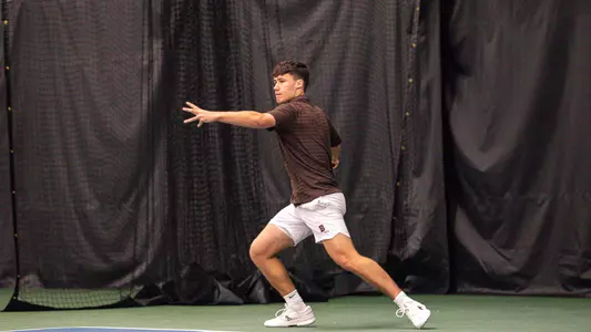 Noah Hernandez Swinging Tennis Racket