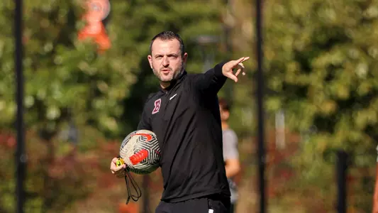 Chase Wileman pointing and coaching