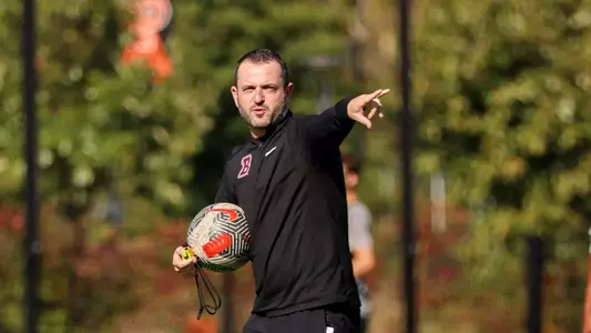 Chase Wileman pointing and coaching