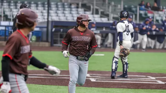 Mika Petersen scores a run against Yale in 2026