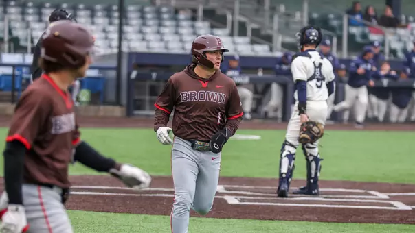 Mika Petersen scores a run against Yale in 2026