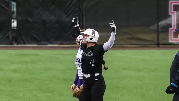 Elli Thompson celebrates at second base after a double