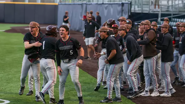 Brown celebrates the winning runs over Penn