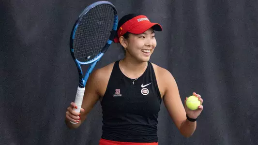 Abigail Lee smiles as she prepares for her match