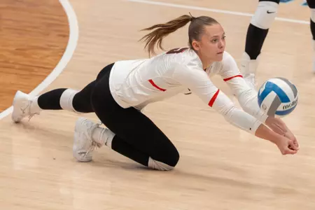 Eve McLaury digs a ball
