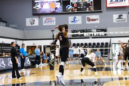 Eve McLaury serves