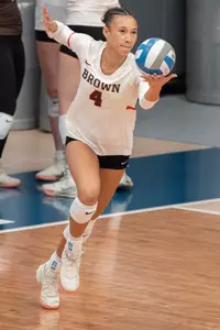 Sophia Wolfson serves