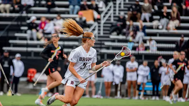 Ruby Sliwkowski running with ball against Princeton