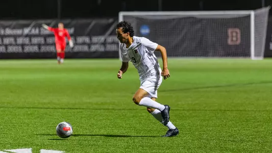 Carlo Brown dribbles the soccer ball