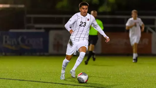 Diego Elizalde dribbles the soccer ball