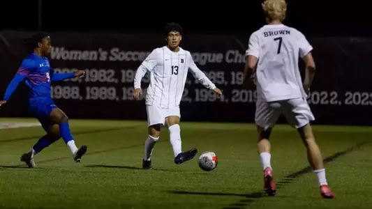 Isaiah Robledo dribbles the soccer ball