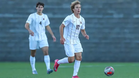 Lorenzo Amaral dribbles the soccer ball