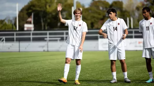 Marshall Treese waves during player introductions