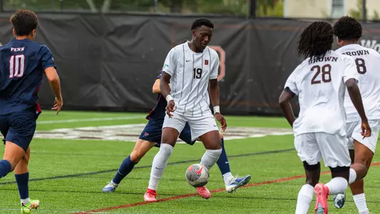 Timi Browne kicks the soccer ball