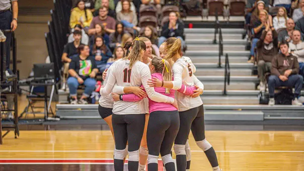Volleyball Huddle Against Dartmouth