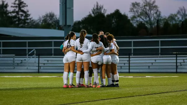 Women's Soccer Team Huddle