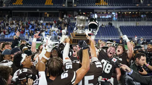 Brown celebrates with the Governor's Cup on October 3, 2025 at Centreville Bank Stadium